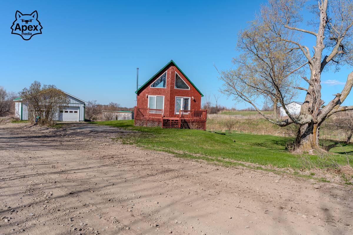 Burke NY listing — front exterior, golden-hour HDR by Apex Pack Media