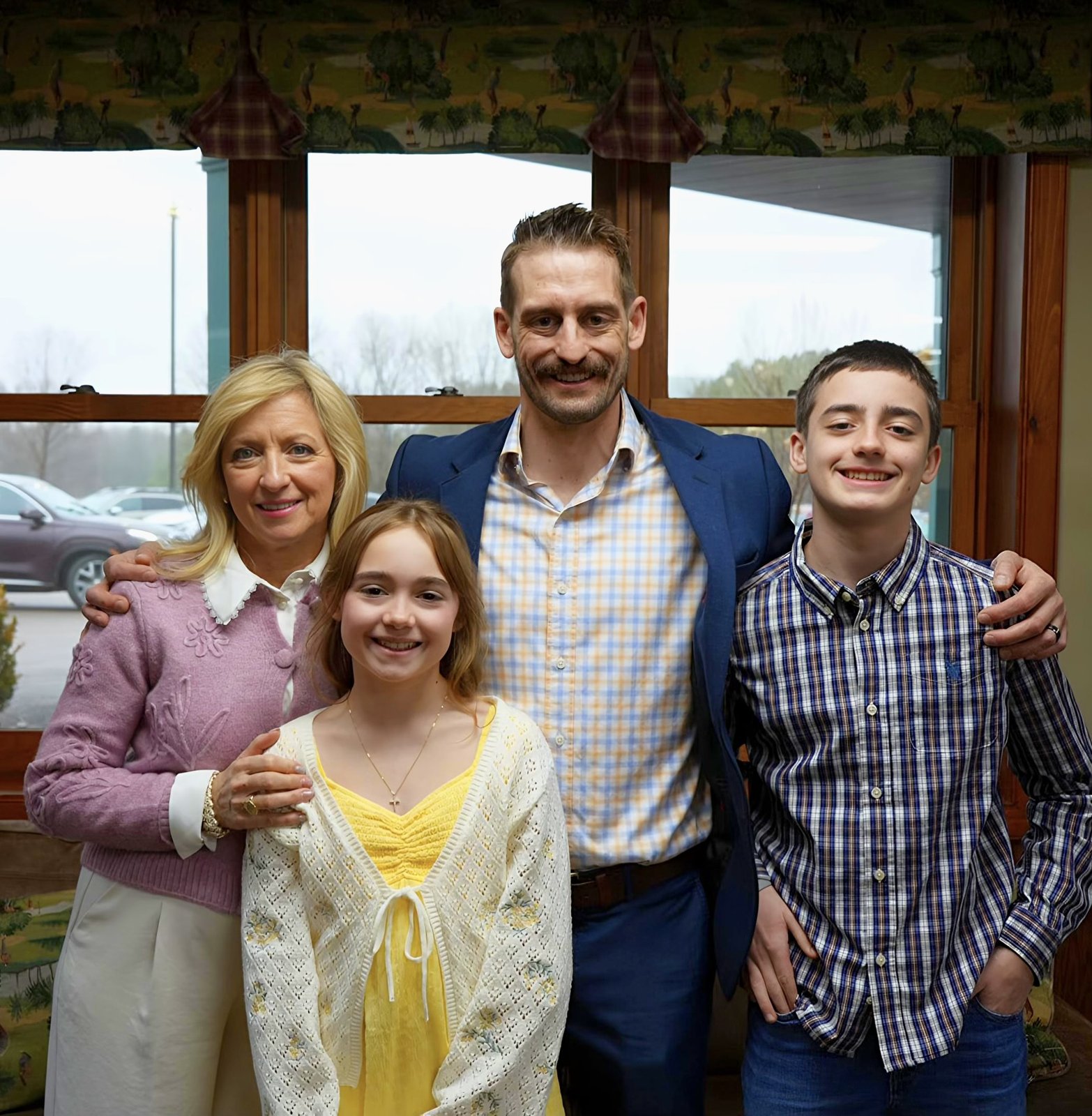 Jay Hicks with his wife and kids